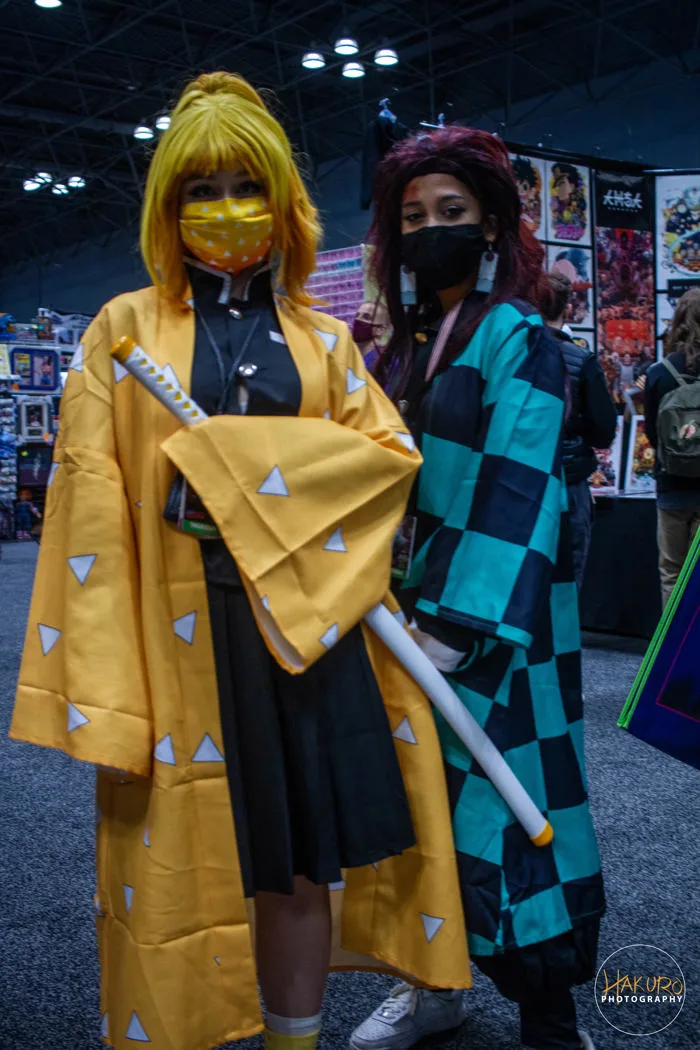 File:Cosplay of Zenitsu Agatsuma and Tanjiro Kamado from Demon Slayer- Kimetsu  no Yaiba at the 2021 New York Comic Con (Batch Edits - 007)  (51573144341).jpg - Wikimedia Commons